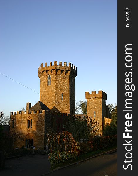 Castle at sunset against blue sky. Castle at sunset against blue sky