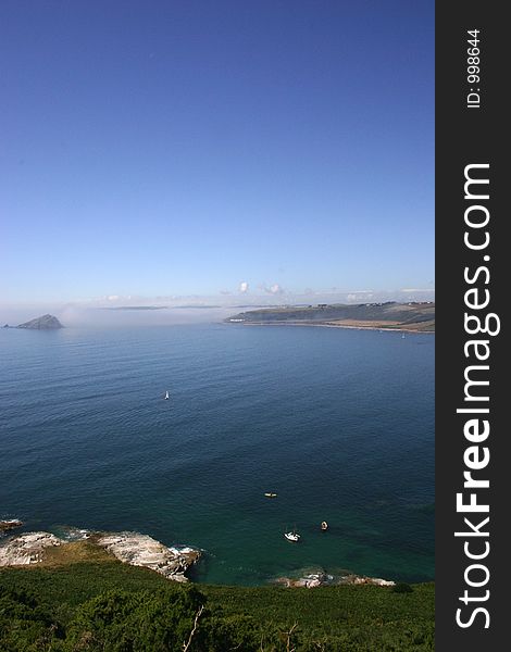 Peacefull costal bay with ripples in water