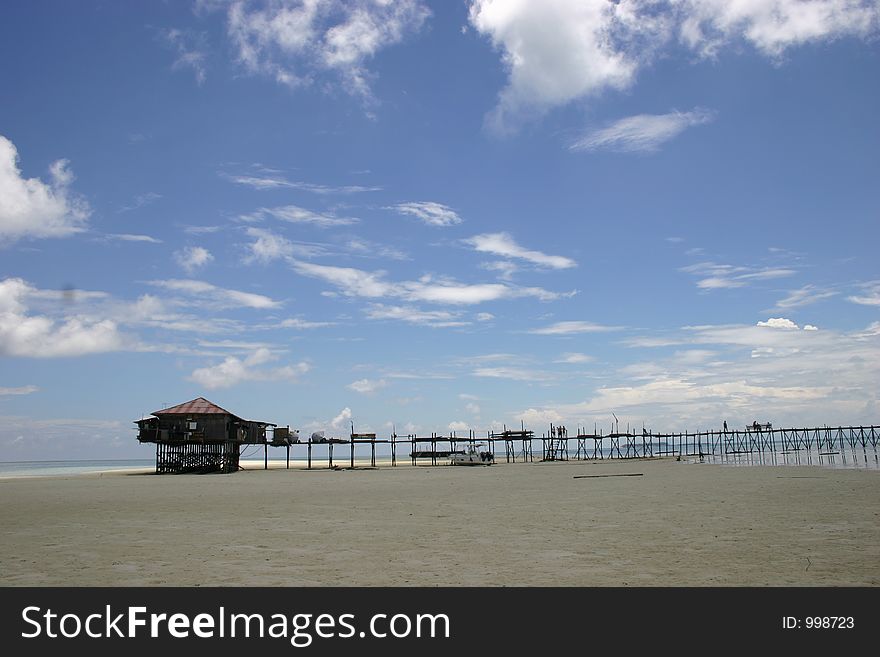 Stilt House On Beach