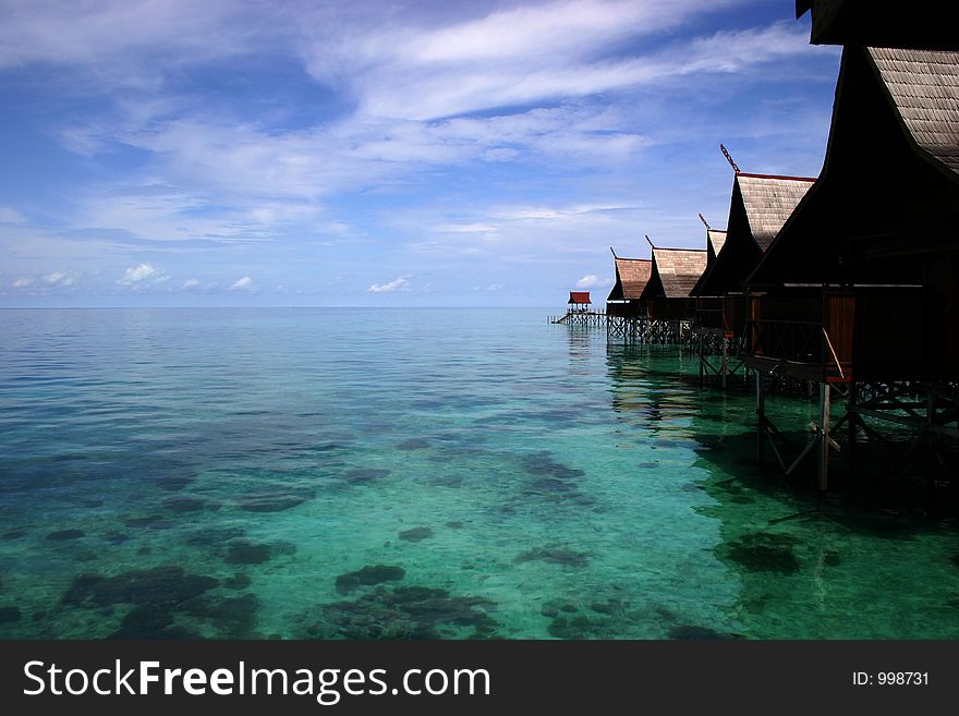 Stilt house above reef and sea. Stilt house above reef and sea