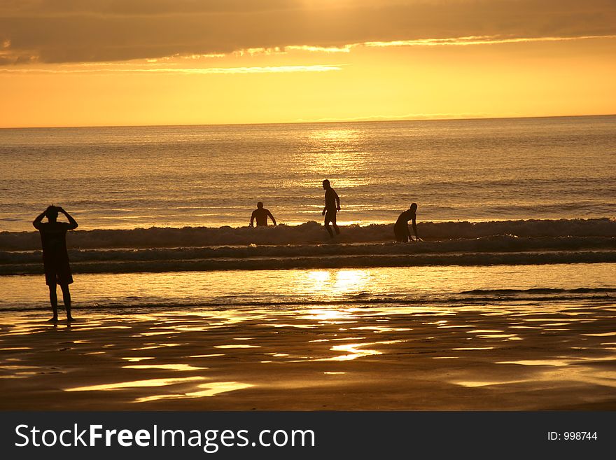 Surfing at sunset. Surfing at sunset