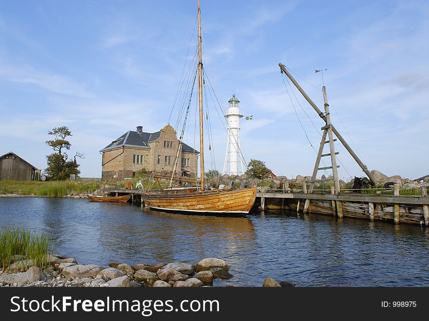 Old Fishing Camp And Lighthouse