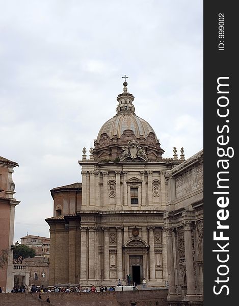 People visiting the Baroque Church of Santa Luca e Martina, Rome, Italy