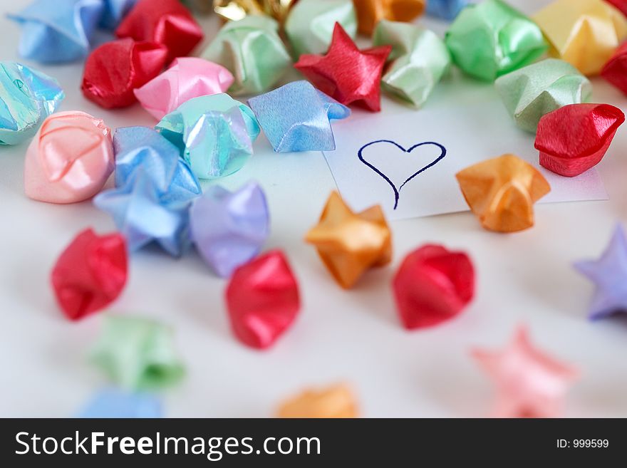 Origami stars around a heart