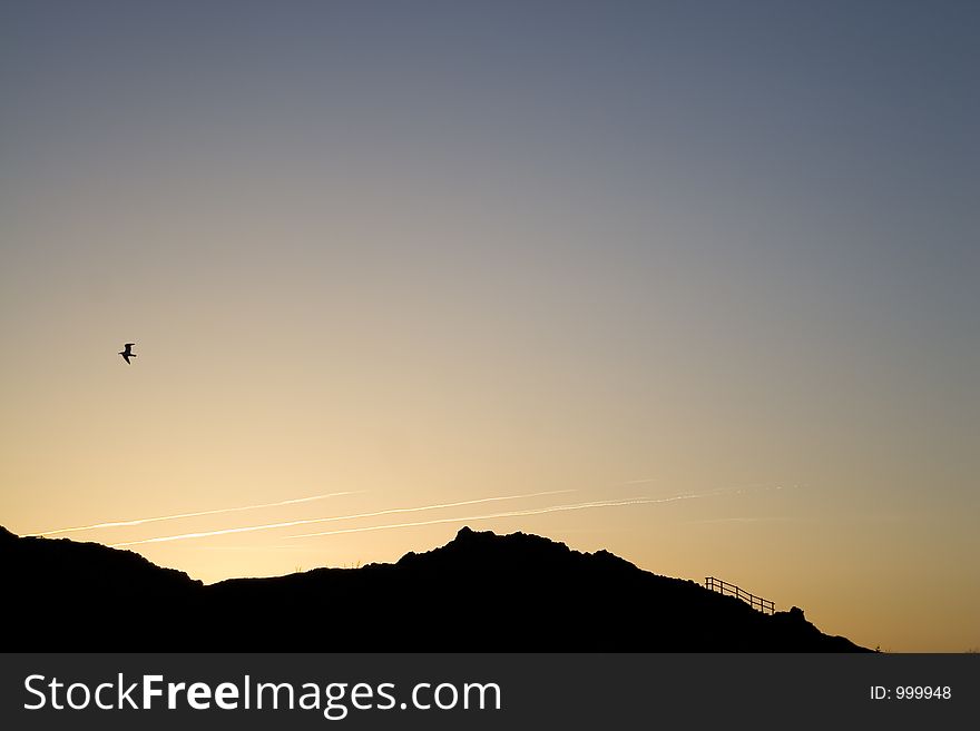 Profile of a hill at sunset. Profile of a hill at sunset.