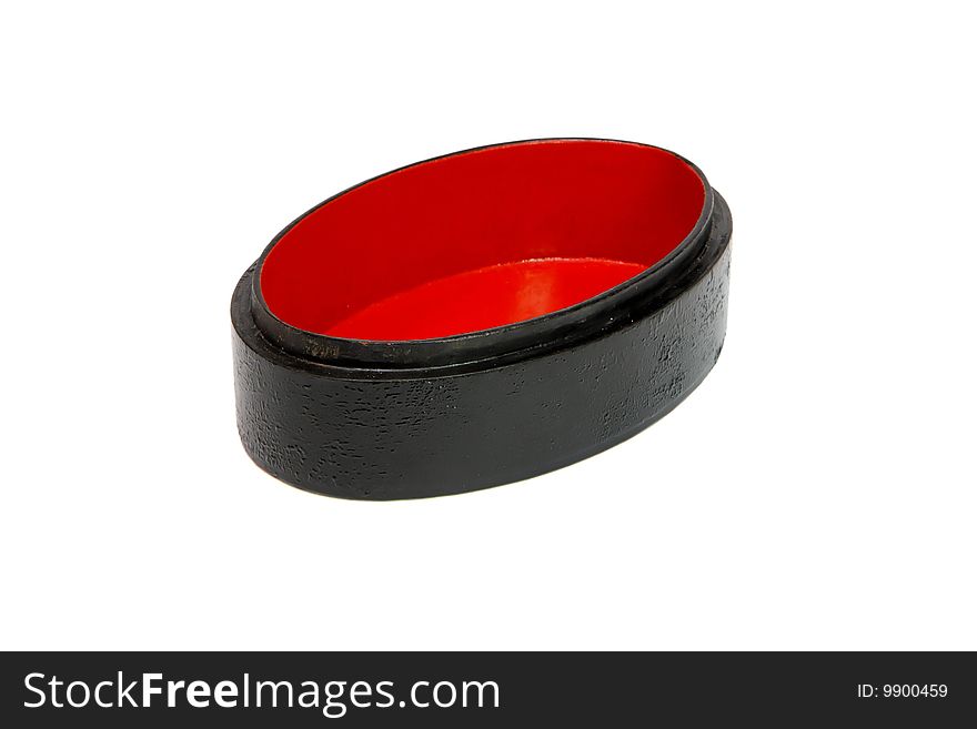 Open empty oval black casket with red lining isolated. Open empty oval black casket with red lining isolated