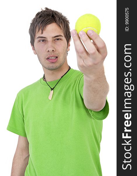 An young man playing tennis