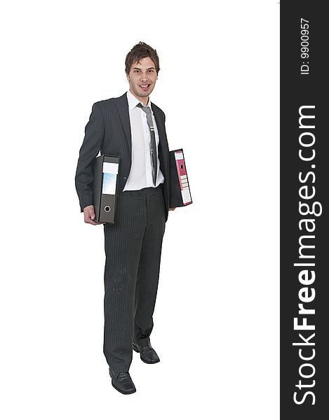 Young business man in suit holding folders. Young business man in suit holding folders