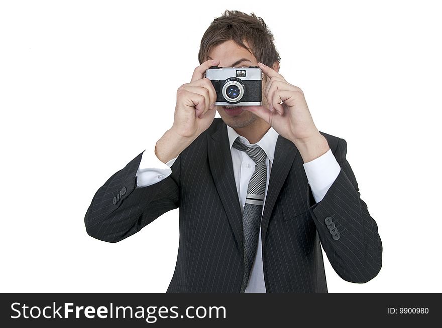Young man in suit taking a photo. Young man in suit taking a photo