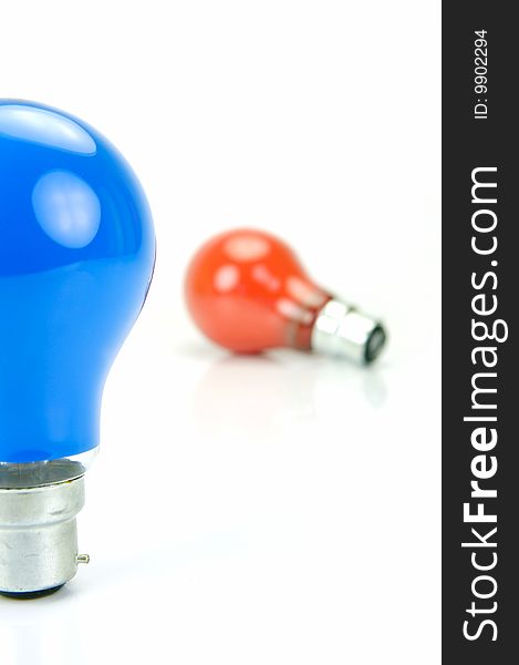 Colored light bulbs isolated against a white background