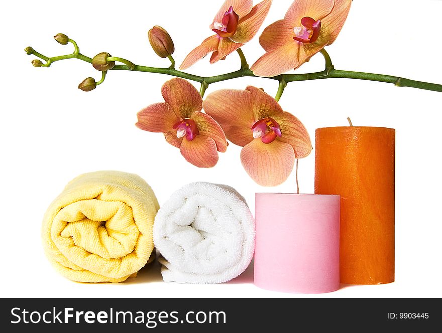 Aromatherapy with candle and orchids