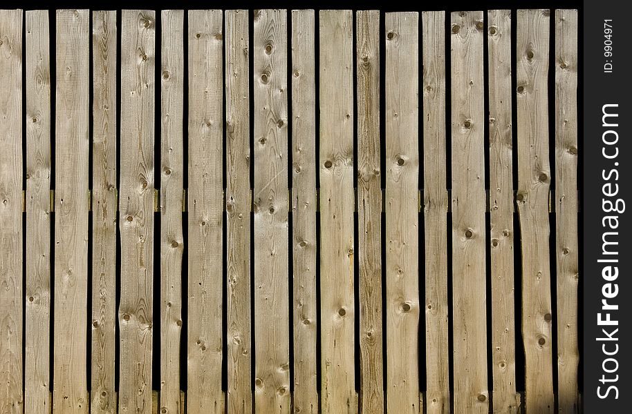 Fence of old wooden plank