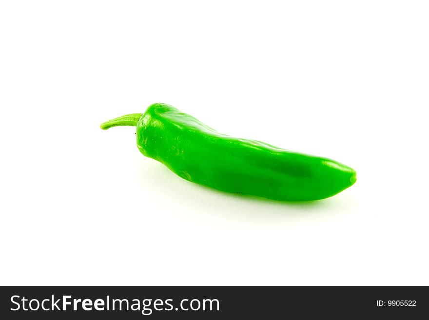 Single green chile with clipping path on a white background