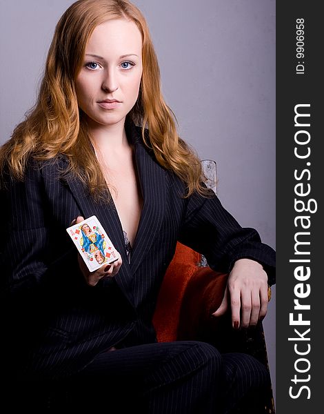 Young woman with playing card. Young woman with playing card