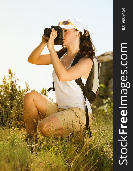 Young Woman Take Photography In The Mountain