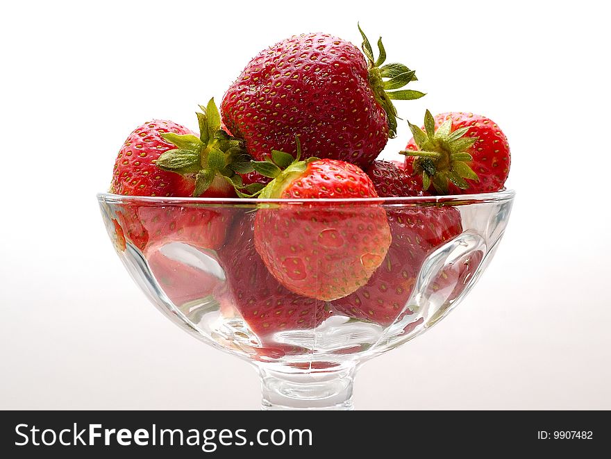 Several fresh strawberries in a glass. Several fresh strawberries in a glass