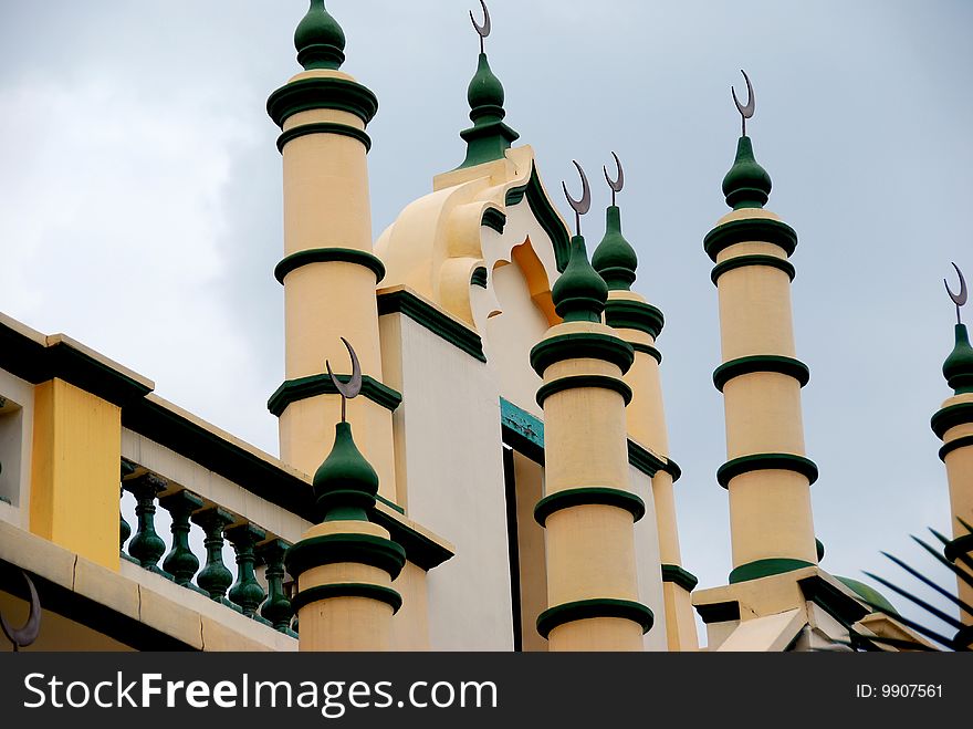 Islamic crescents top round roof columns at the historic 1907 Abdul Gaffor Mosque - Xu Lei Photo / Lee Snider Photo Images. Islamic crescents top round roof columns at the historic 1907 Abdul Gaffor Mosque - Xu Lei Photo / Lee Snider Photo Images.