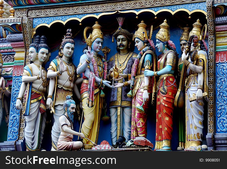 Splendid carved Hindu deities painted in vibrant colours atop the main facade of the Sri Krishnan temple on the Albert Mall - Xu Lei Photo / Lee Snider Photo Images. Splendid carved Hindu deities painted in vibrant colours atop the main facade of the Sri Krishnan temple on the Albert Mall - Xu Lei Photo / Lee Snider Photo Images.