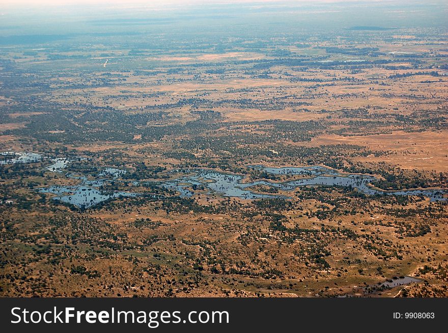 Aerial view of a river in the Okavango Delta. Aerial view of a river in the Okavango Delta.