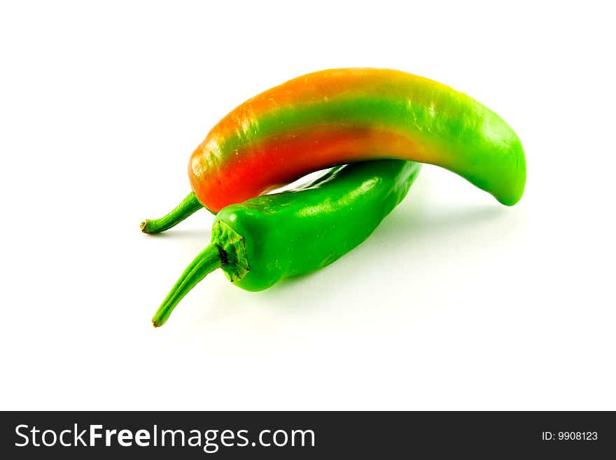 Green and red chili with clipping path on a white background