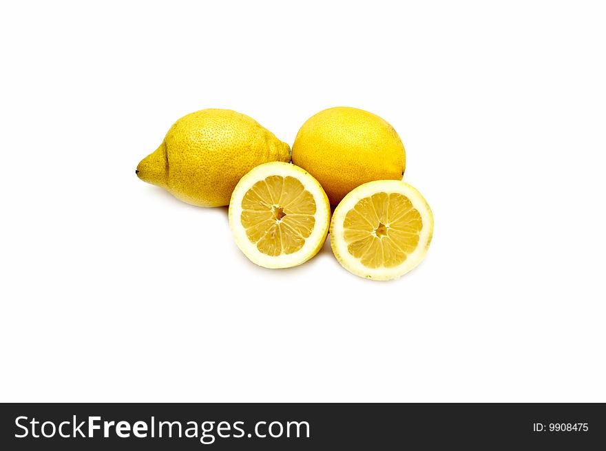 Fresh yellow lemons on white. Fresh yellow lemons on white