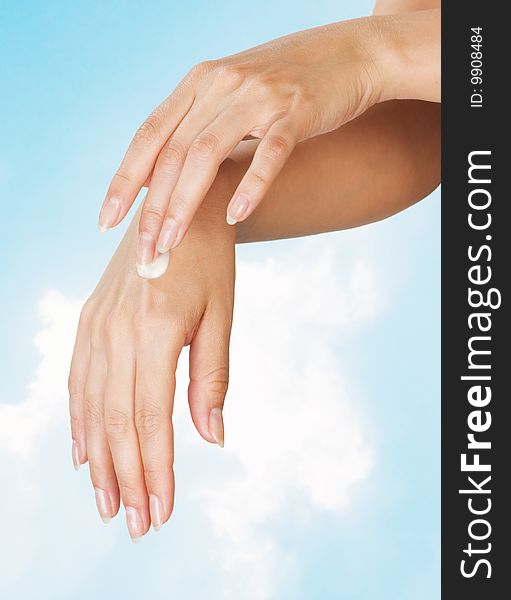 Two woman hands with moisturizer body cream. Two woman hands with moisturizer body cream