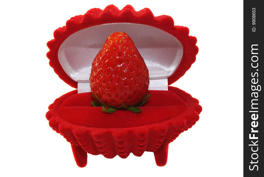 Strawberry in a box, the gift, on a white background, is isolated. Strawberry in a box, the gift, on a white background, is isolated.