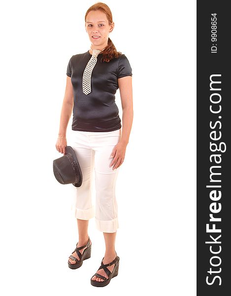 An all dressed up woman in black blouse and white trousers, with a hat in her hand and a necktie made from white pearls, for white background. An all dressed up woman in black blouse and white trousers, with a hat in her hand and a necktie made from white pearls, for white background.