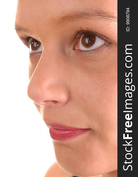 The half face of a beautiful young woman whit her eyes and red lips
on white background. The half face of a beautiful young woman whit her eyes and red lips
on white background.