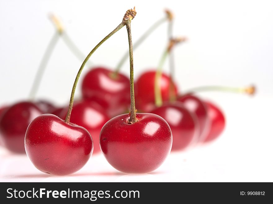 Cherries on a  white background