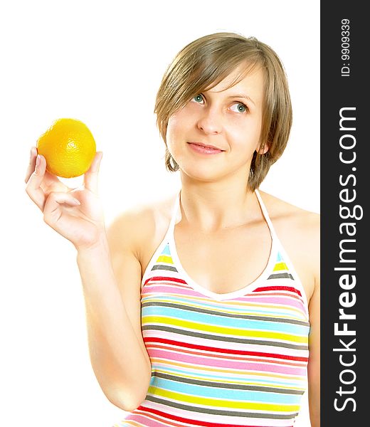 Portrait of a cute Caucasian blond girl with a nice colorful striped dress who is smiling and she is holding a fresh orange in her hand. Isolated on white. Portrait of a cute Caucasian blond girl with a nice colorful striped dress who is smiling and she is holding a fresh orange in her hand. Isolated on white.