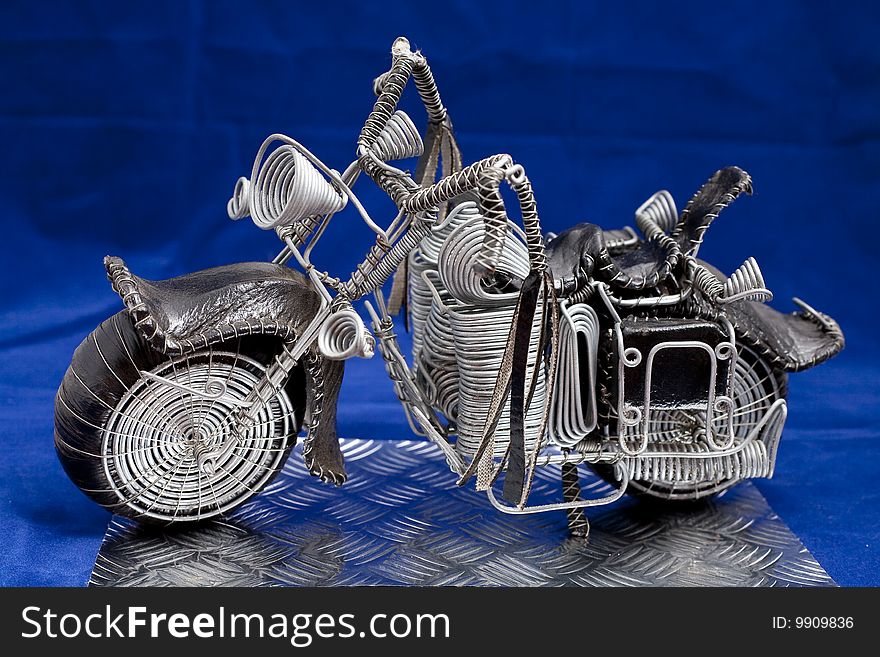 Wire frame easy rider chopper hand crafted on blue background. Wire frame easy rider chopper hand crafted on blue background