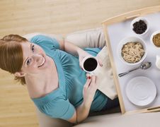 Cute Redhead With Breakfast Tray Stock Photo Cute Redhead With Breakfast Tray Stock Photo