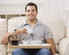 Man With Breakfast Tray And Coffee Royalty Free Stock Images Man With Breakfast Tray And Coffee Royalty Free Stock Images