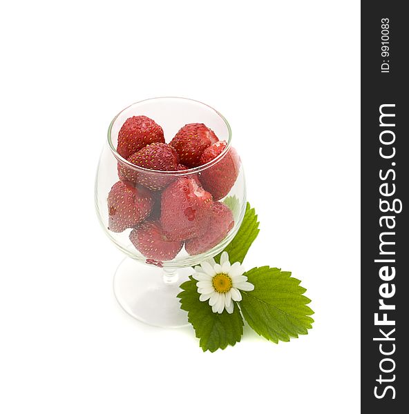 Strawberries in the glass isolated on white