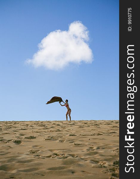 Young Woman at Beach on Sunny Day