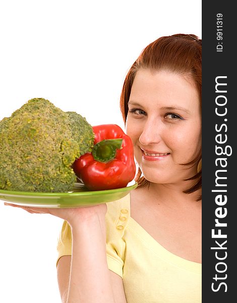 Woman eating vegetables on white background