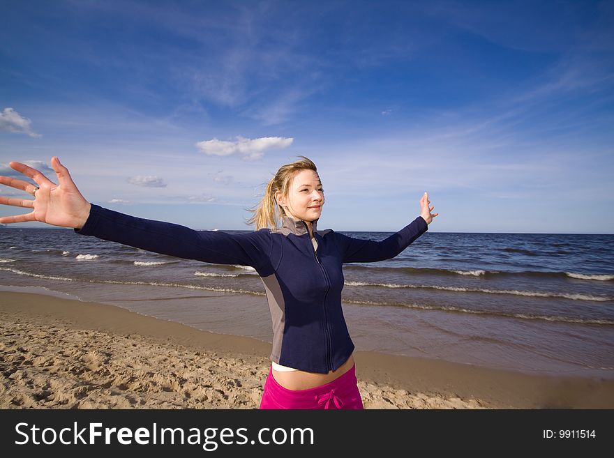 Active woman running on the beach. Active woman running on the beach