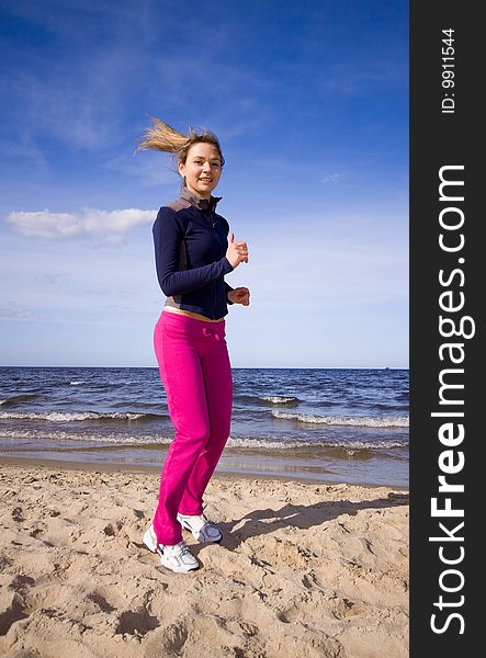 Active woman on the beach