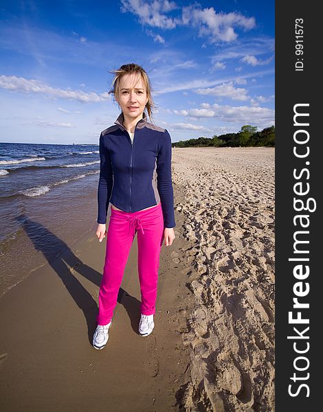 Active Woman On The Beach