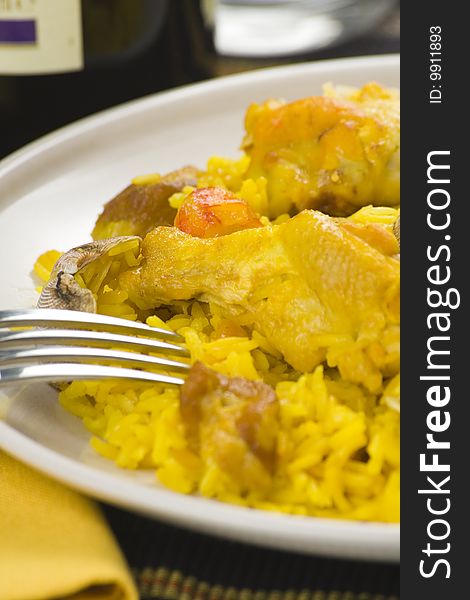 Delicious seafood paella and chicken rice yellow isolated