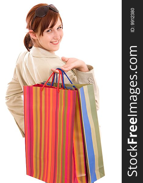 Young brunette woman with shopping bags. Young brunette woman with shopping bags