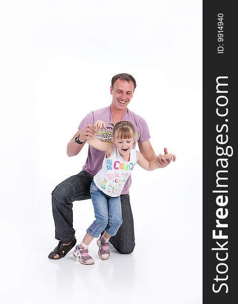 Young man with his little daughter laughing, playing. Young man with his little daughter laughing, playing