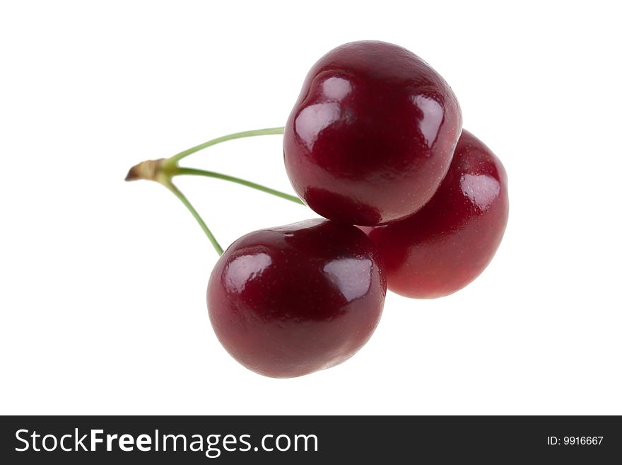 Three cherries, isolated on white background