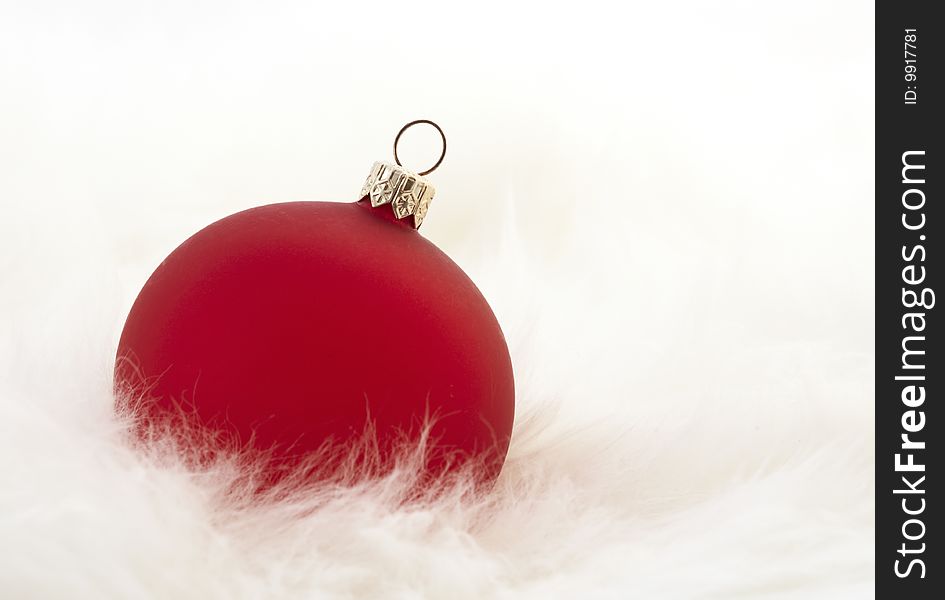 Red Christmas ball on white background. Red Christmas ball on white background
