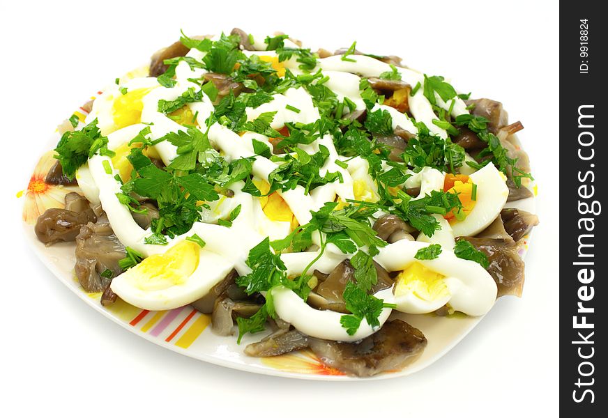 Delicious salad with fresh eggs and mushrooms