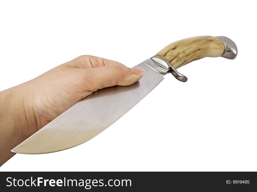 Hand offering to take a knife. The handle is made of bone of a deer (with clipping path). Here is no logo (!). Just year of manufacturing. 1986. Hand offering to take a knife. The handle is made of bone of a deer (with clipping path). Here is no logo (!). Just year of manufacturing. 1986.