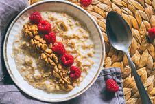 Morning Breakfast, Oatmeal In Milk With Berries Royalty Free Stock Images