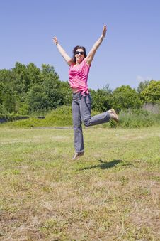 Woman Jumping Stock Photo