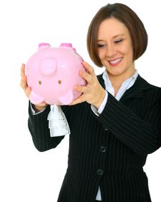 Happy Woman Taking Money Out Of Piggy Bank Stock Photography